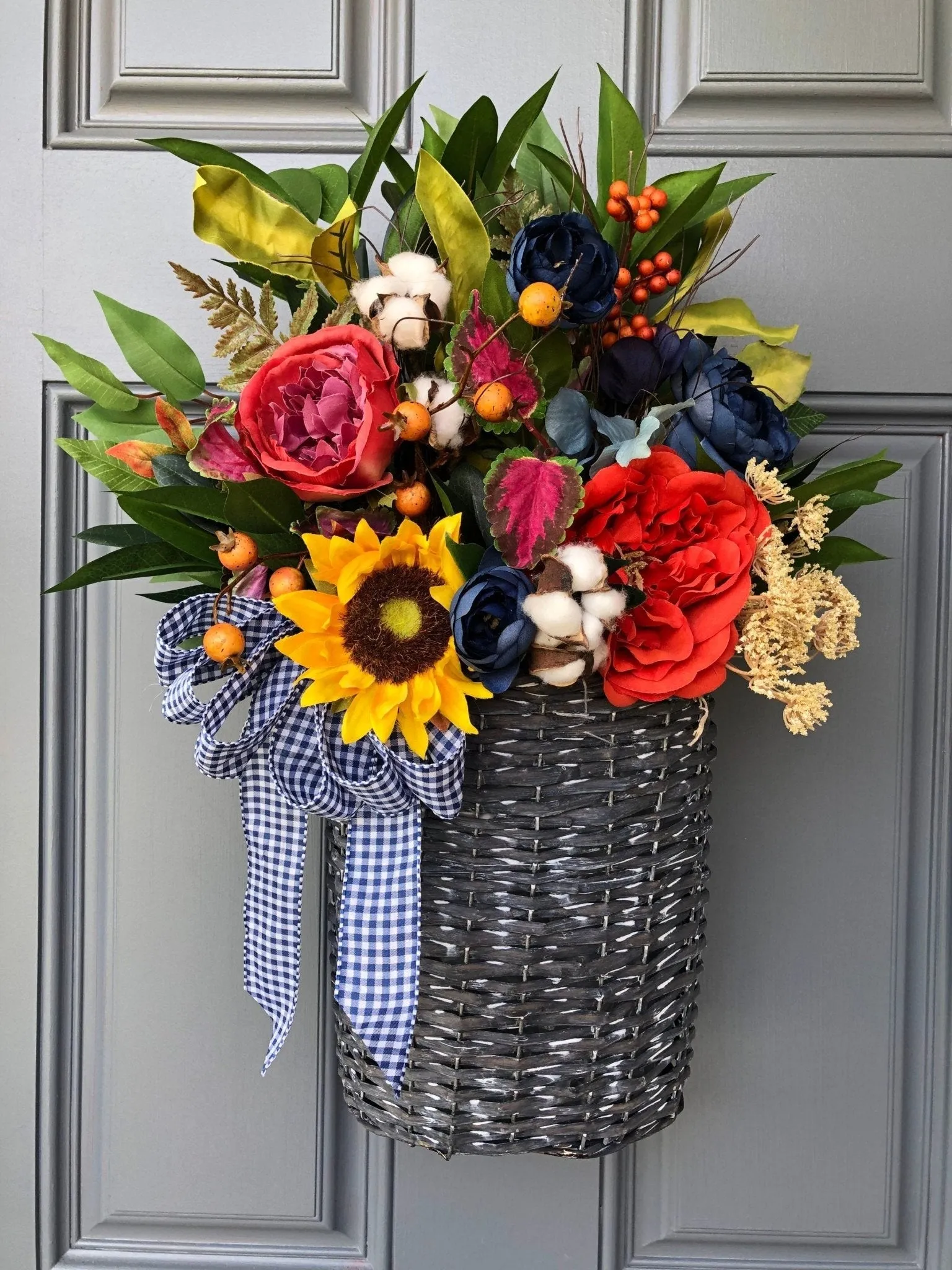 Spring Basket with Sunflowers and Blue Ranunculus