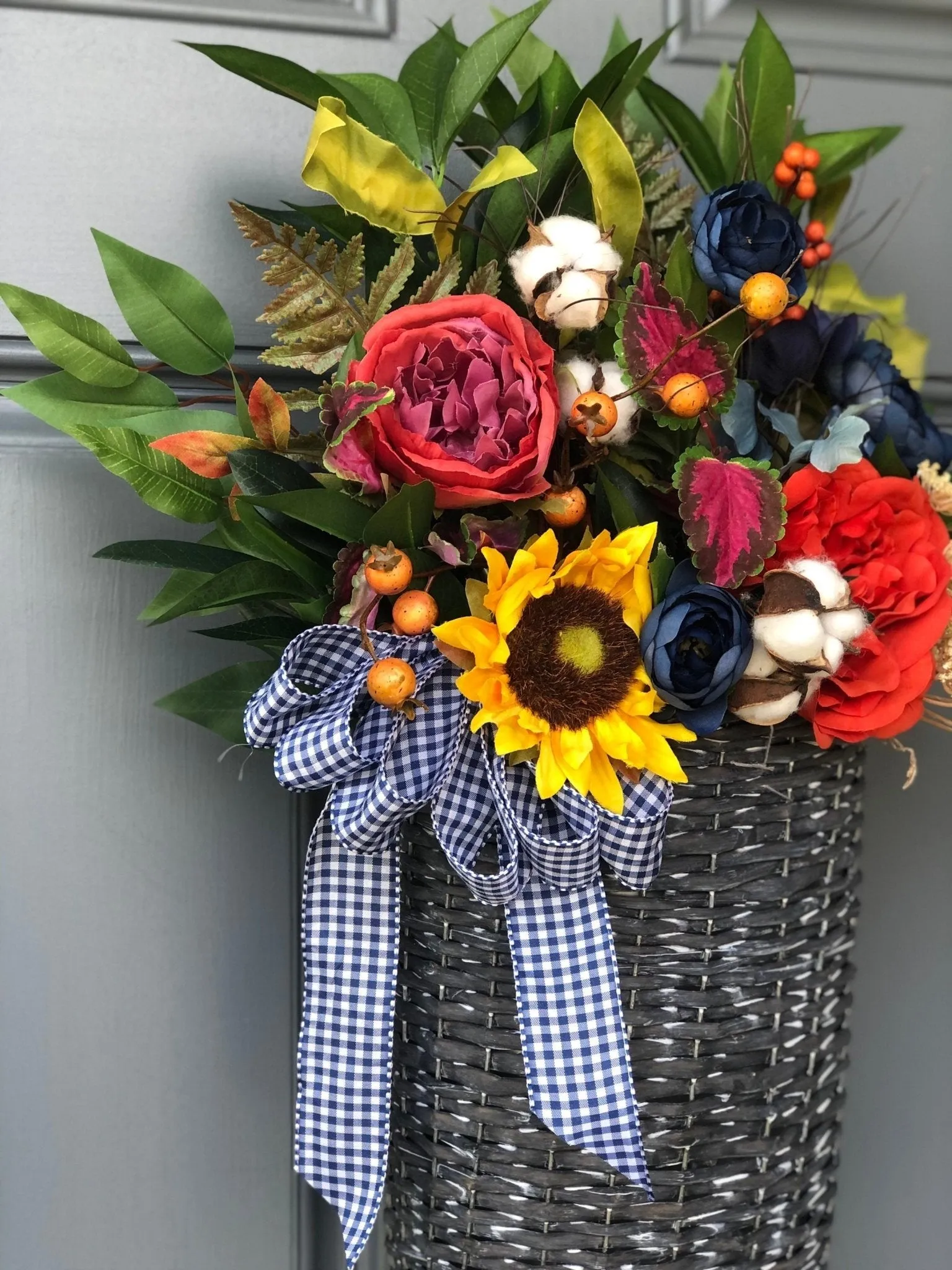 Spring Basket with Sunflowers and Blue Ranunculus
