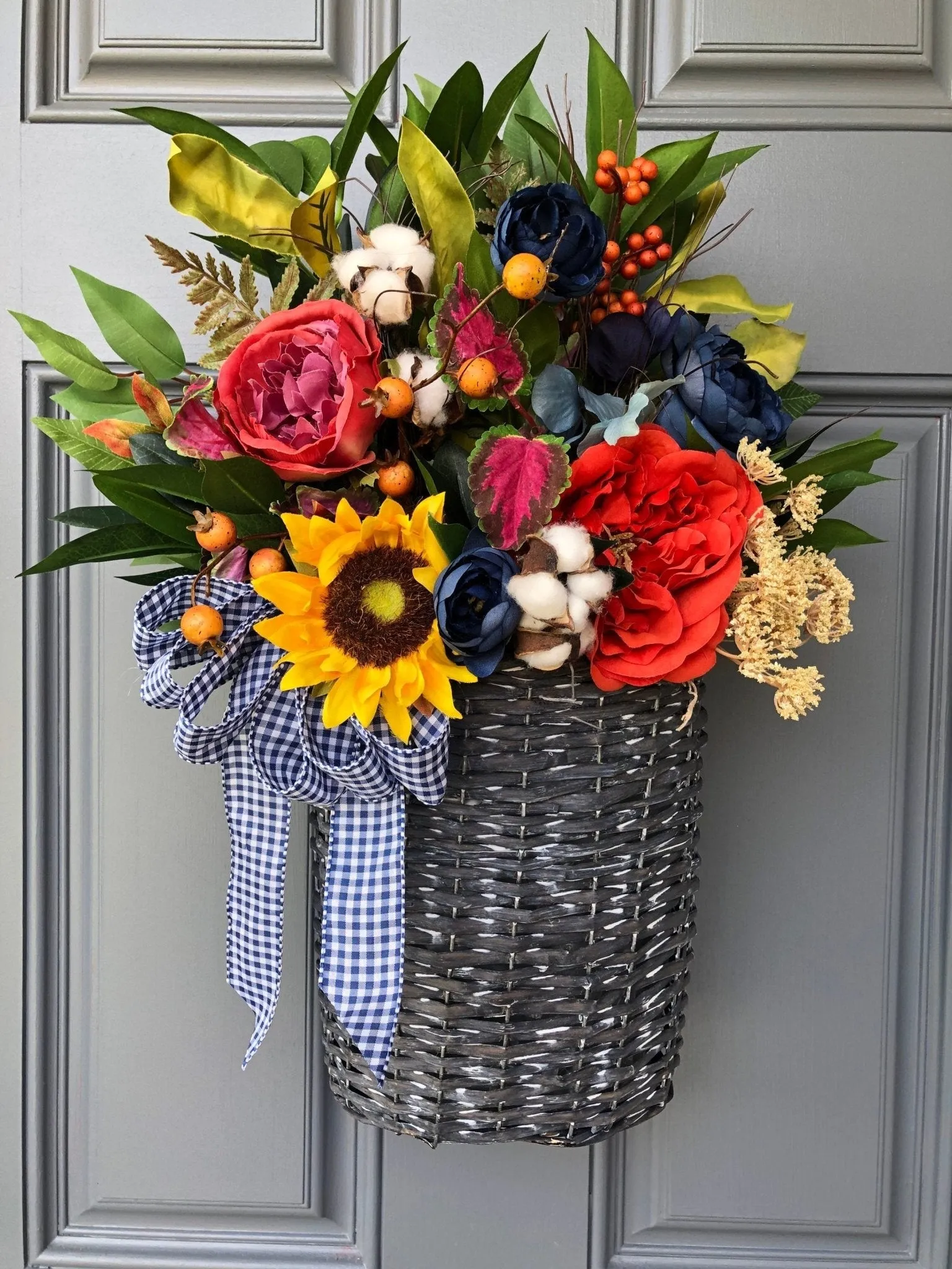 Spring Basket with Sunflowers and Blue Ranunculus