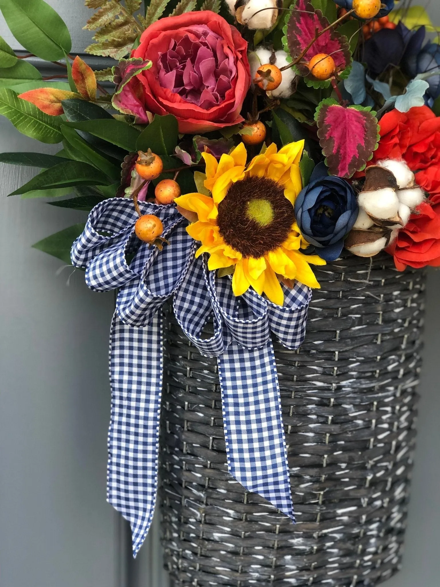 Spring Basket with Sunflowers and Blue Ranunculus