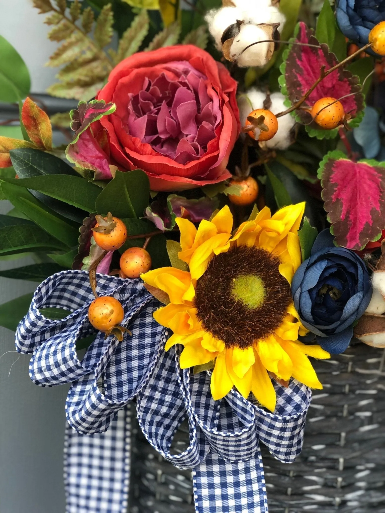 Spring Basket with Sunflowers and Blue Ranunculus
